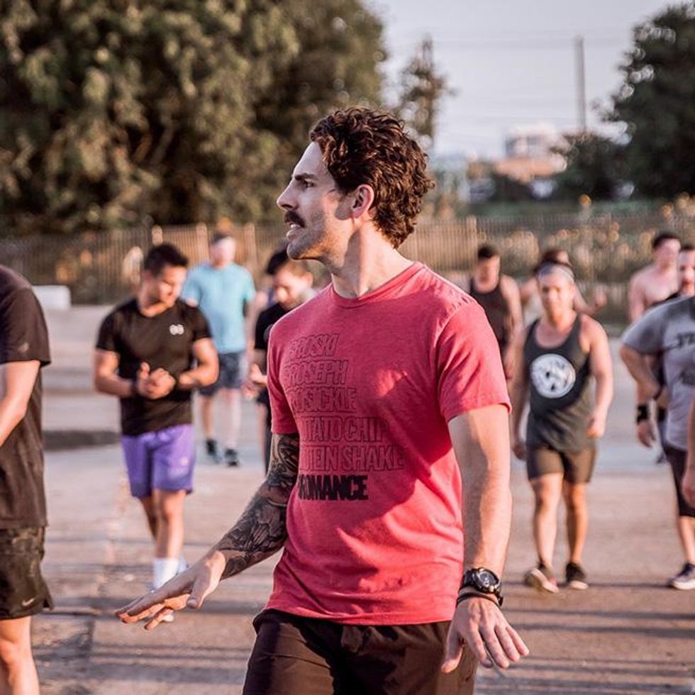 Will Lanier instructing LGBTQ athletes participating in a recent OUTWOD event.