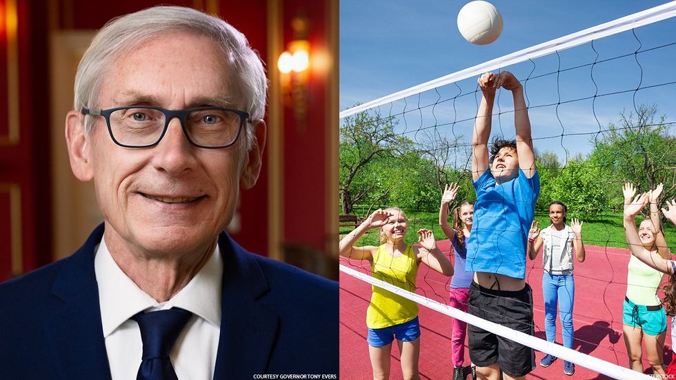 Wisconsin Gov. Tony Evers and young volleyball players