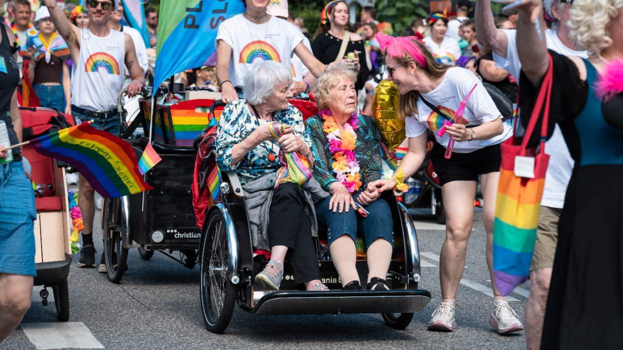 Women in wheelchair at LGBTQ+ pride celebration