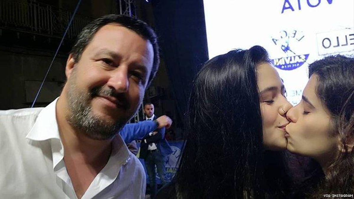 Women kiss for homophobic politician