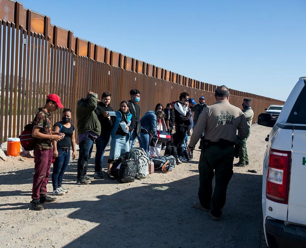 World Humanitarian Day migrants held US border wall texas mexico