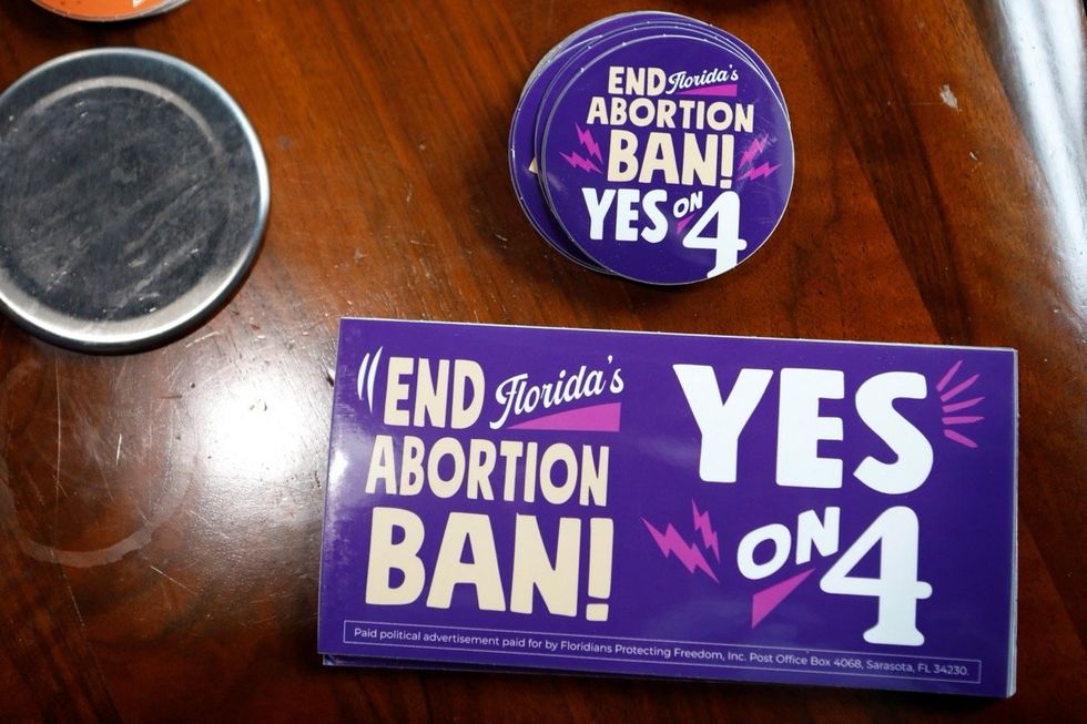 "Yes On 4!" campaign materials on ending Florida's strict abortion ban