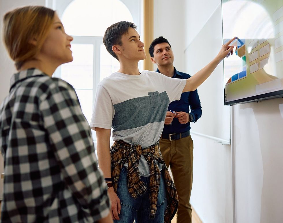 young queer friendly LGBTQIA inclusive classroom students