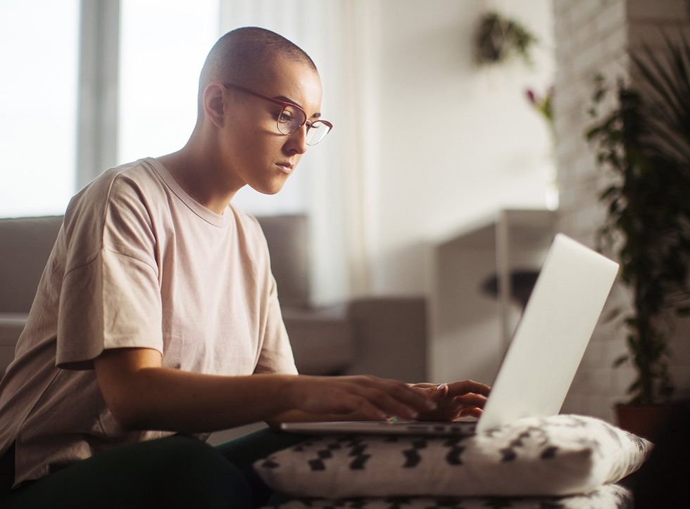Young woman working on laptop