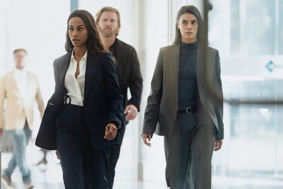 Zoe Salda\u00f1a as Joe, Thad Luckinbill as Kyle, Laysla De Oliveira as Cruz in 'Lioness' season 3.