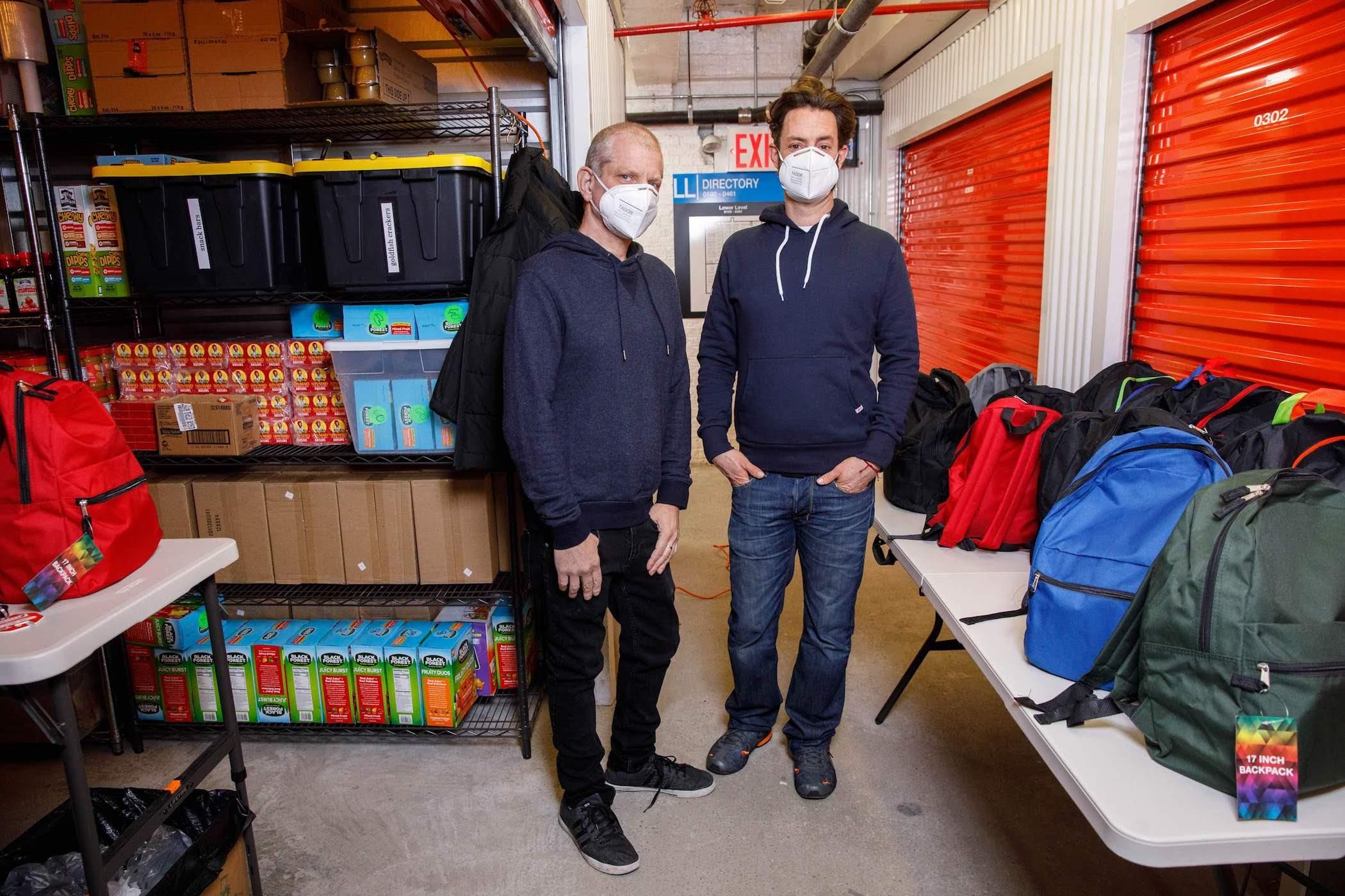 gay couple supplies backpacks full of COVID supplies to homeless populations