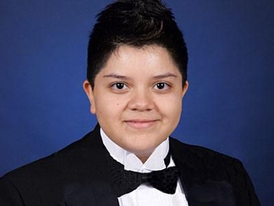School Agrees to Publish Tuxedo-Clad Student's Photo
