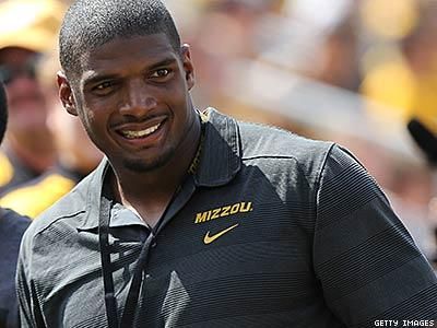 Michael Sam, Cowboys Welcome Lull in Media Attention
