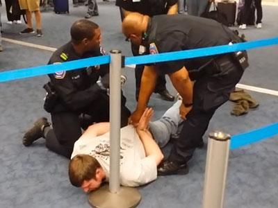 WATCH: Texas Airline Crowd Tackles Antigay Attacker
