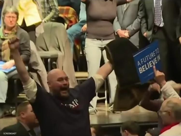 A Trump supporter is removed from a Bernie Sanders rally