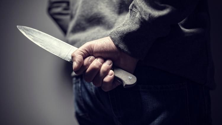 A man holding a knife
