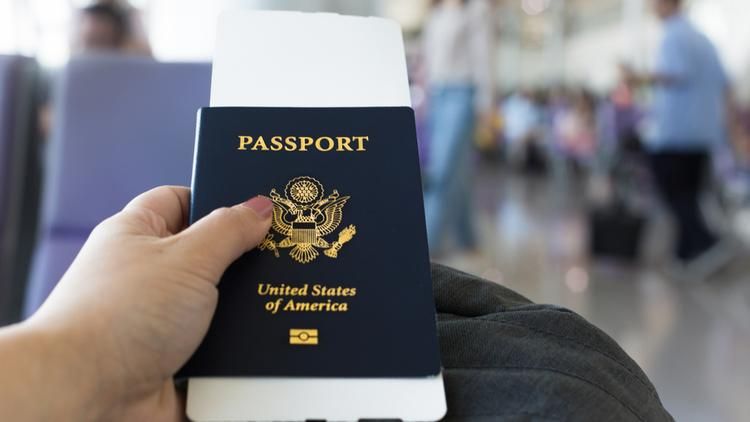 A person holding a passport