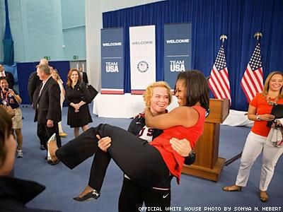 Michelle Obama Gets Picked Up By Wrestler
