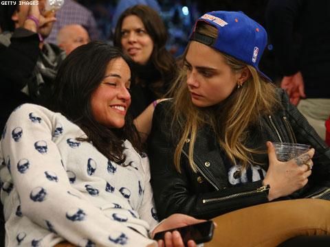Michelle Rodriguez and Victoria&#039;s Secret Model Cara Delevingne Engage in Major PDA at Knicks Game 