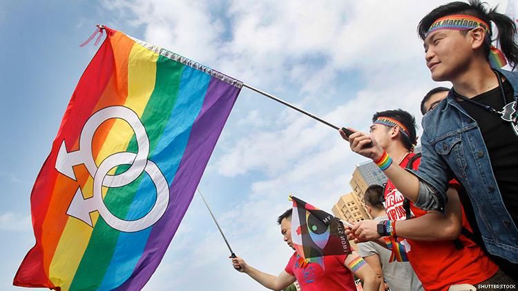 Chinese Police Beat Women To Ground For Giving Out Rainbow Badges