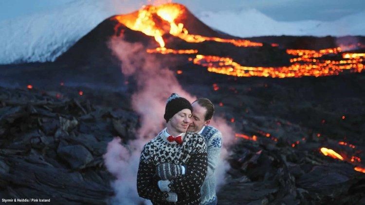 Gay couple wedding in front of Iceland volcano