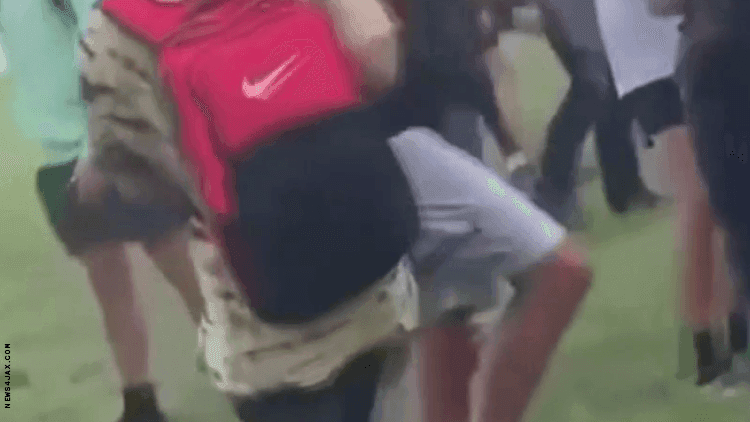 Image from video showing students yelling anti-LGBTQ+ slurs. 