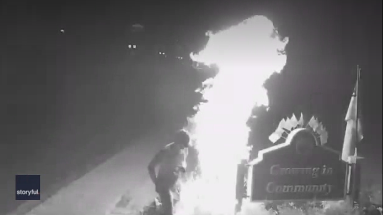 Lansing man catching Pride flags on fire