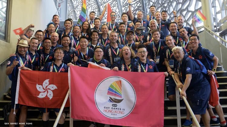 Group of LGBTQ+ people with Gay Games Hong Kong sign