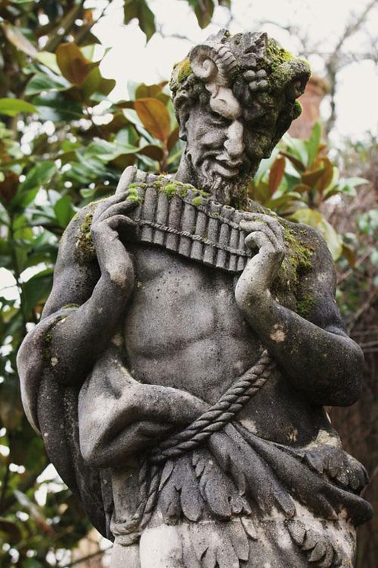 A statue of Pan, at Wisley Gardens, in the United Kingdom