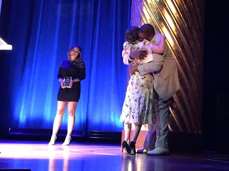 Hilton Als hugs Tavi Gevinson after her emotional speech. 