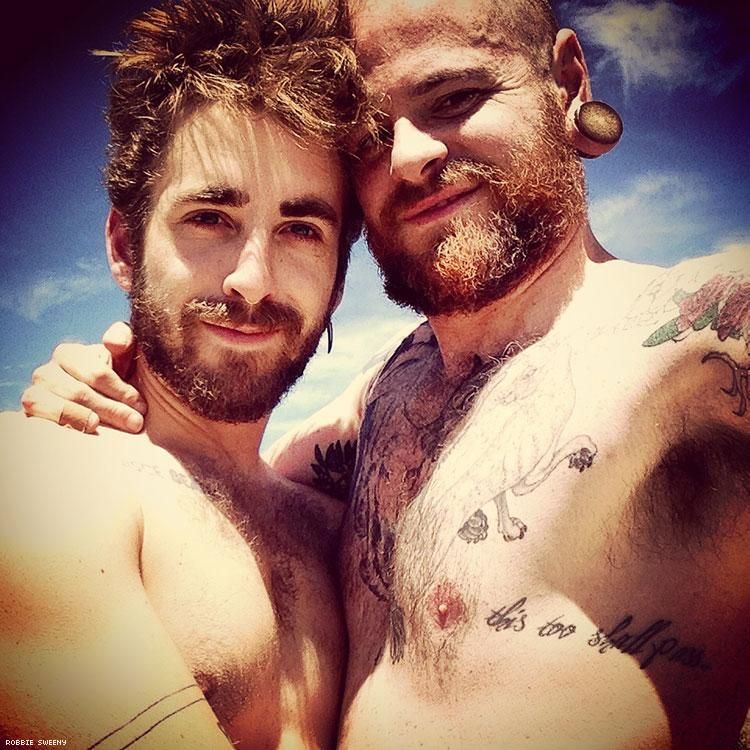 Robbie Sweeny (right) and his husband, James Fleming. Read more about Robbie below.