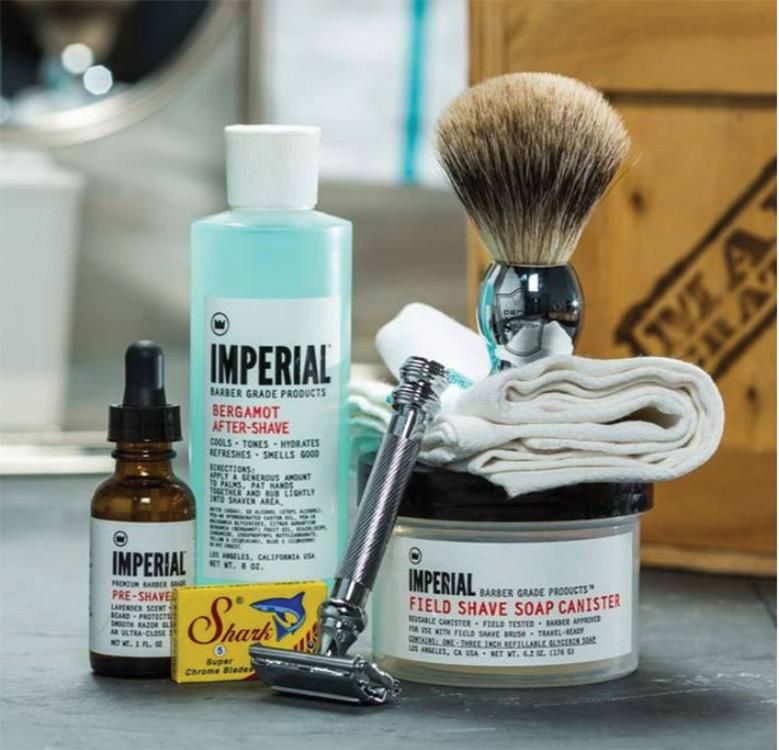 The wooden Clean Shave Crate includes a Parker straight razor, badger brush, oil, and bergamot aftershave. ($139 each, ManCrates.com)