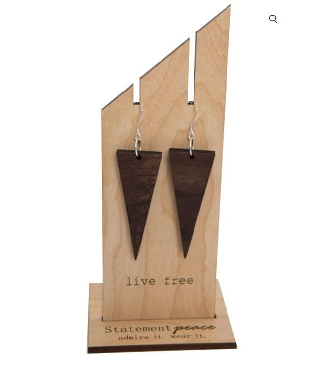 Buy these Statement Peace Wood Triangle Earrings and they plant a tree. ($45, WearStatementPeace.com)