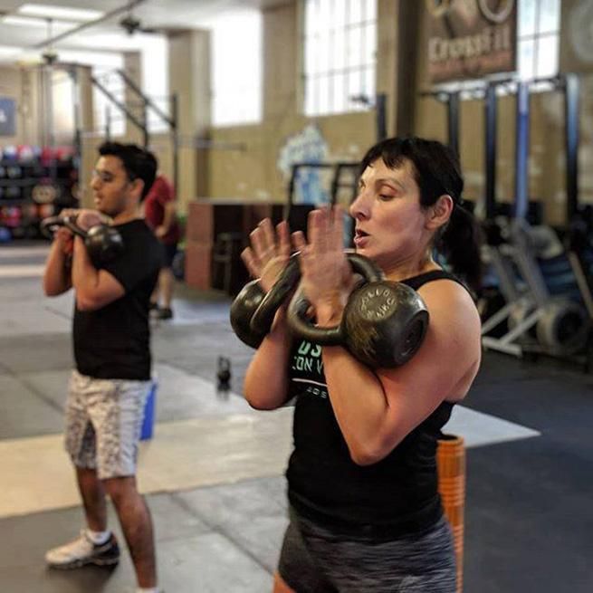 Audrey Fernandez-Elliott, mid workout at her CrossFit box, Sundown CrossFit in Santa Clara, California.