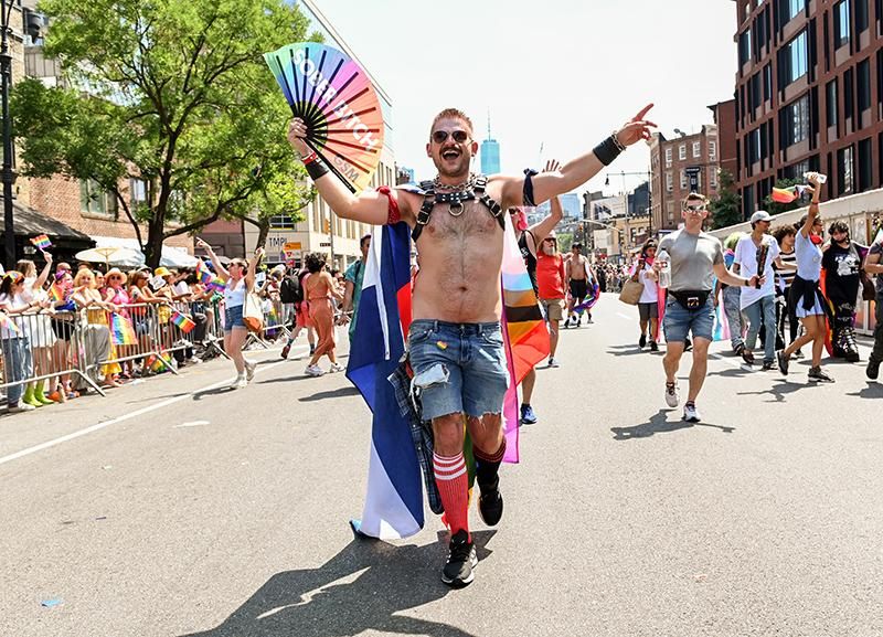 A person walks the New York City Pride Parade on June 26, 2022. The annual NYC Pride March returned fully in person this year after being scaled back in 2021 and cancelled in 2020 due to the COVID-19 pandemic.