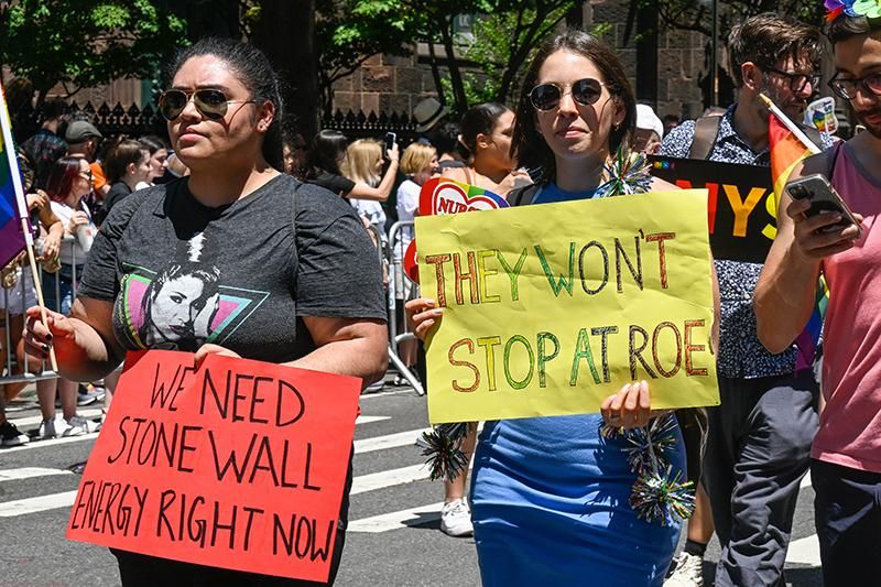 Marchers protest against the recent overturn of Roe v. Wade during the NYC Pride Parade on June 26, 2022