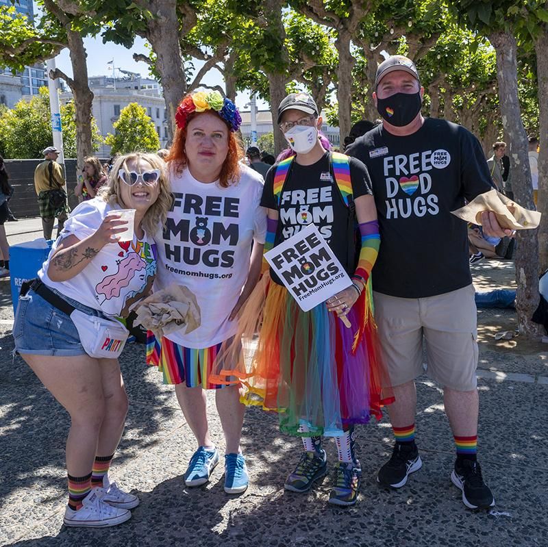 A Free Hugs group gather in Civic Center Plaza after the 52nd Annual SF Pride Parade to offer free hugs to anyone on June 26, 2022