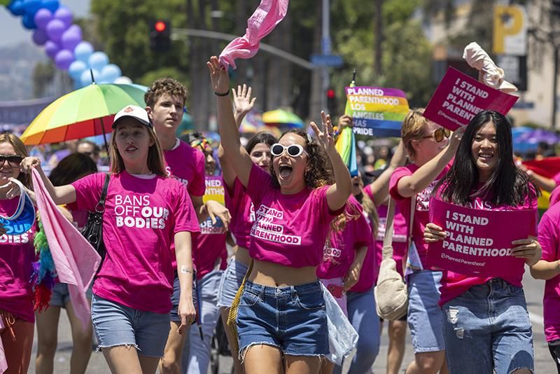 Women with Planned Parenthood march in the annual Pride Parade on June 12, 2022 in the Hollywood section of Los Angeles, California