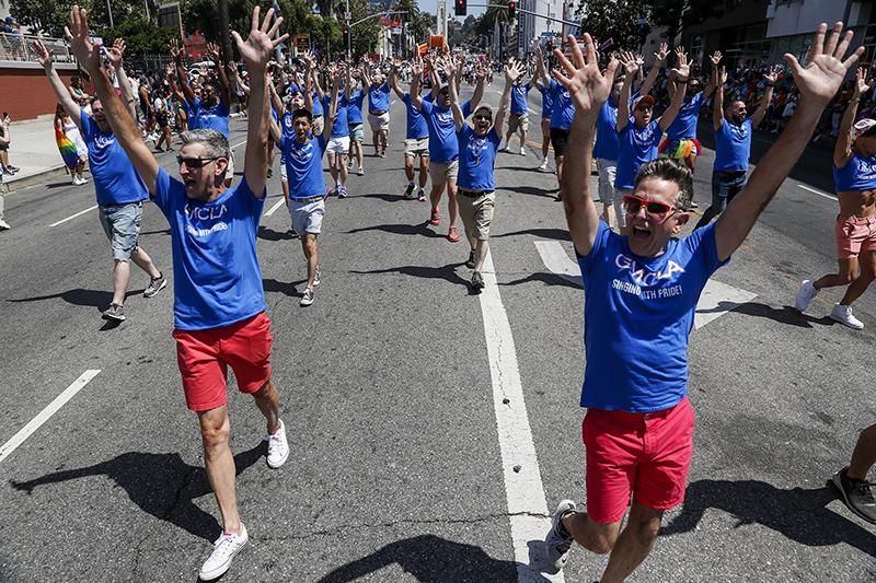 Thousands march down Hollywood Blvd in the LA Pride Parade on June 12, 2022