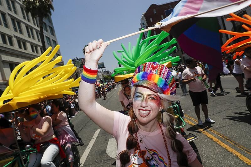 Marchers make their way down Hollywood Blvd in the LA Pride Parade on June 12, 2022