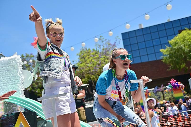 WeHo Pride's Next Gen Icon JoJo Siwa rides a float with her girlfriend Kylie Prew in the city of West Hollywood's Pride Parade on June 05, 2022