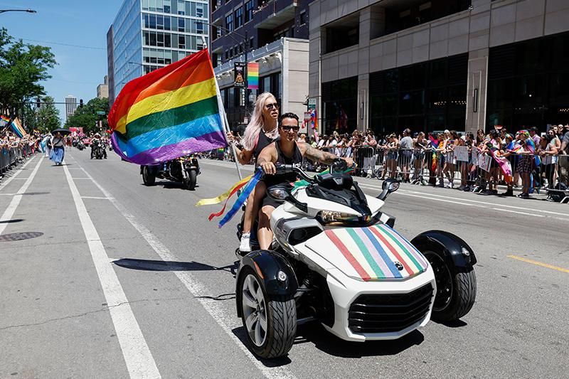 People participate in the 51st LGBTQ Pride Parade in Chicago, Illinois, on June 26, 2022