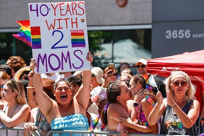 Parade watchers at the 51st LGBTQ Pride Parade in Chicago, Illinois, on June 26, 2022