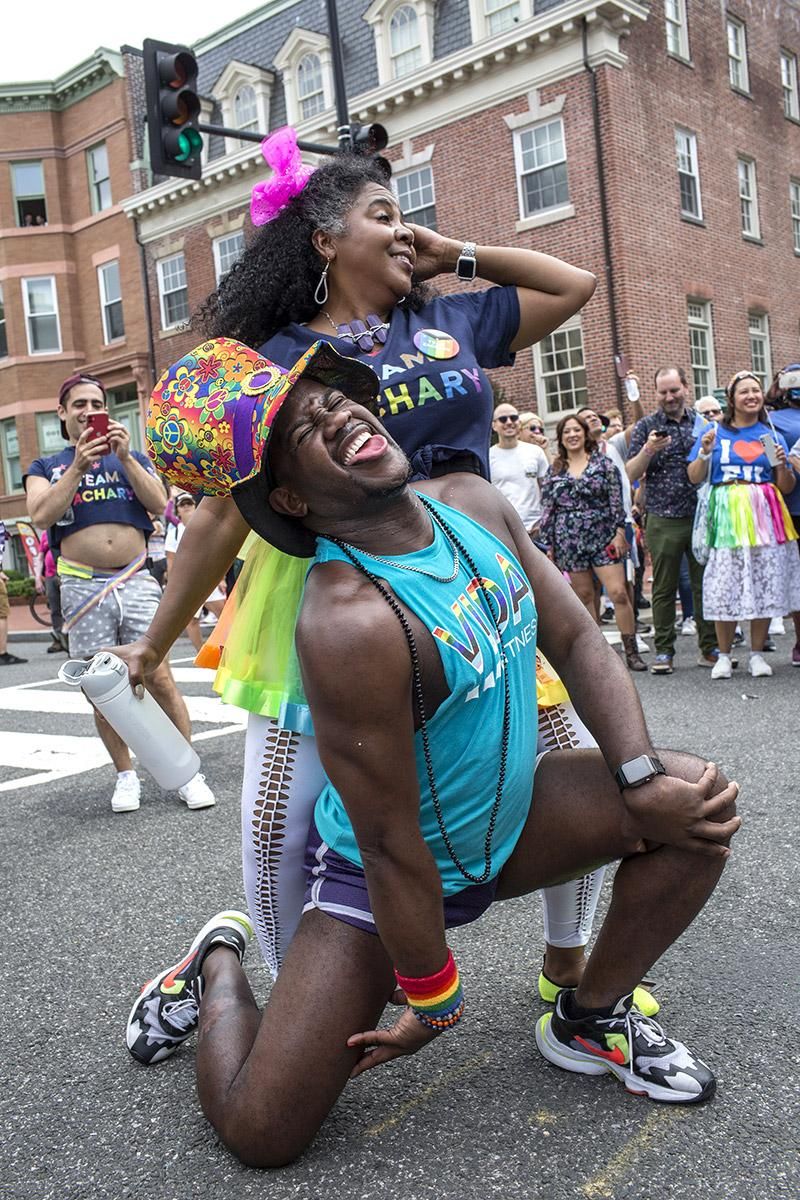 People dancing during the annual LGBT Pride Parade celebrations in Washington DC on June 11, 2022