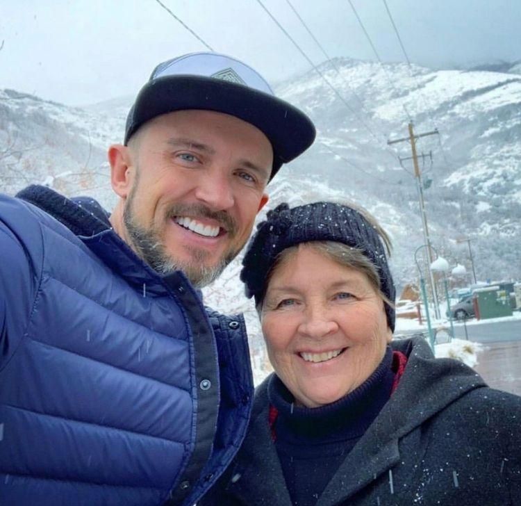 gay man and mother in snow