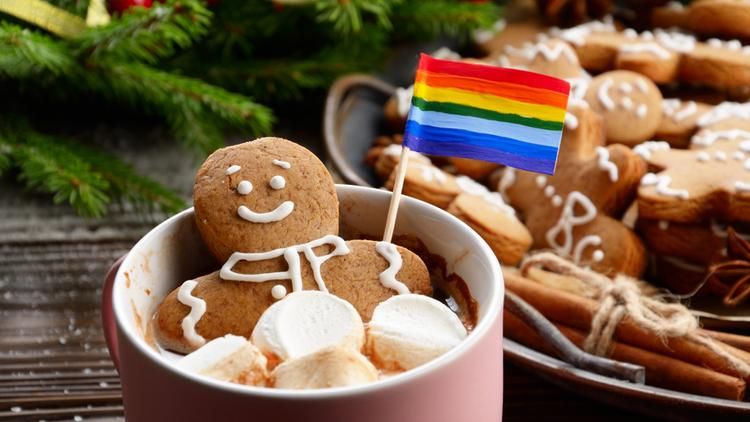 Gingerbread cookie in hot cocoa with rainbow flag